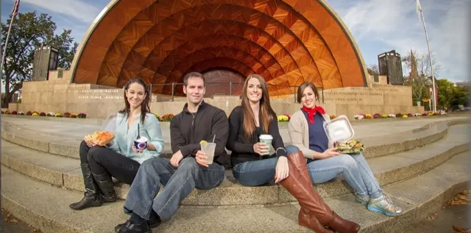 Clients on the steps of the Hatch Shell